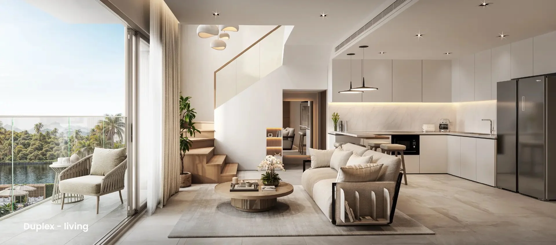 Bright and spacious duplex living room at Siamese Bangtao with balcony and modern kitchen