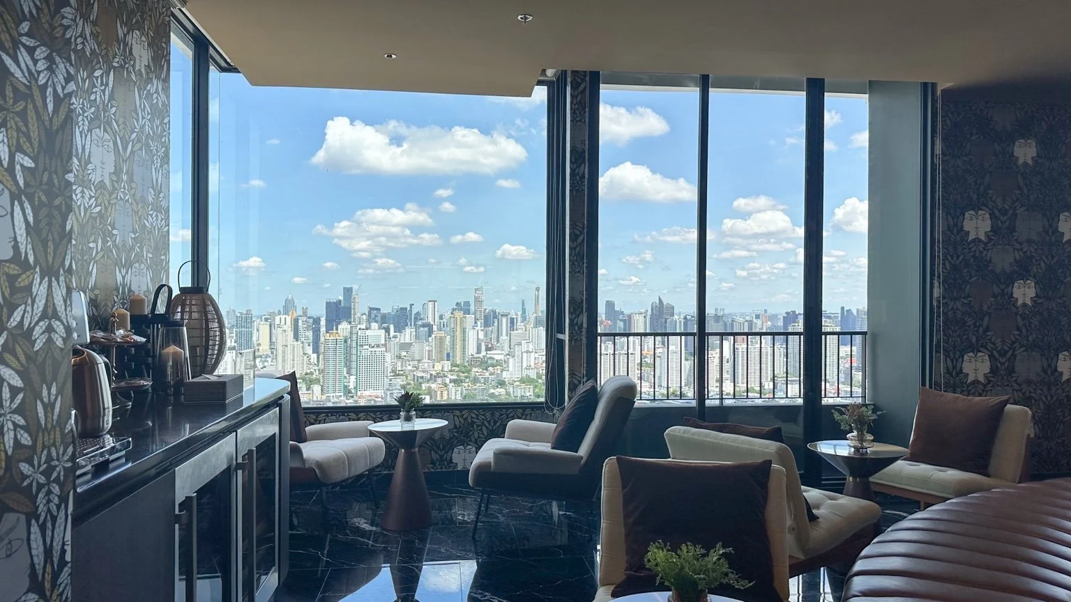 Moon Bar at Noble Form Thonglor with seating and skyline views.