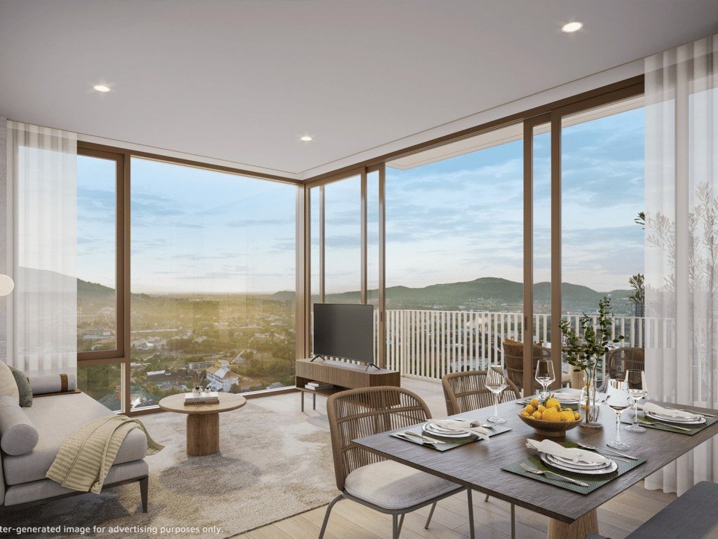 Dining and living room interior at Vehha Hua Hin with mountain views and corner glazing in Hua Hin, Thailand.