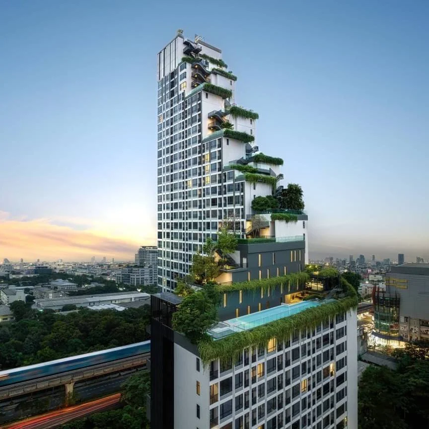 Park Origin Phayathai tower exterior with cascading sky gardens.