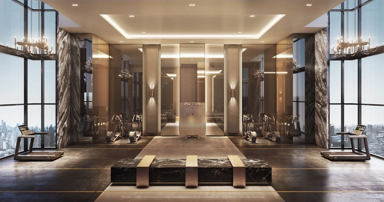 Cloud Fitness gym at The Address Siam–Ratchathewi with skyline views, premium equipment and floor-to-ceiling glazing.