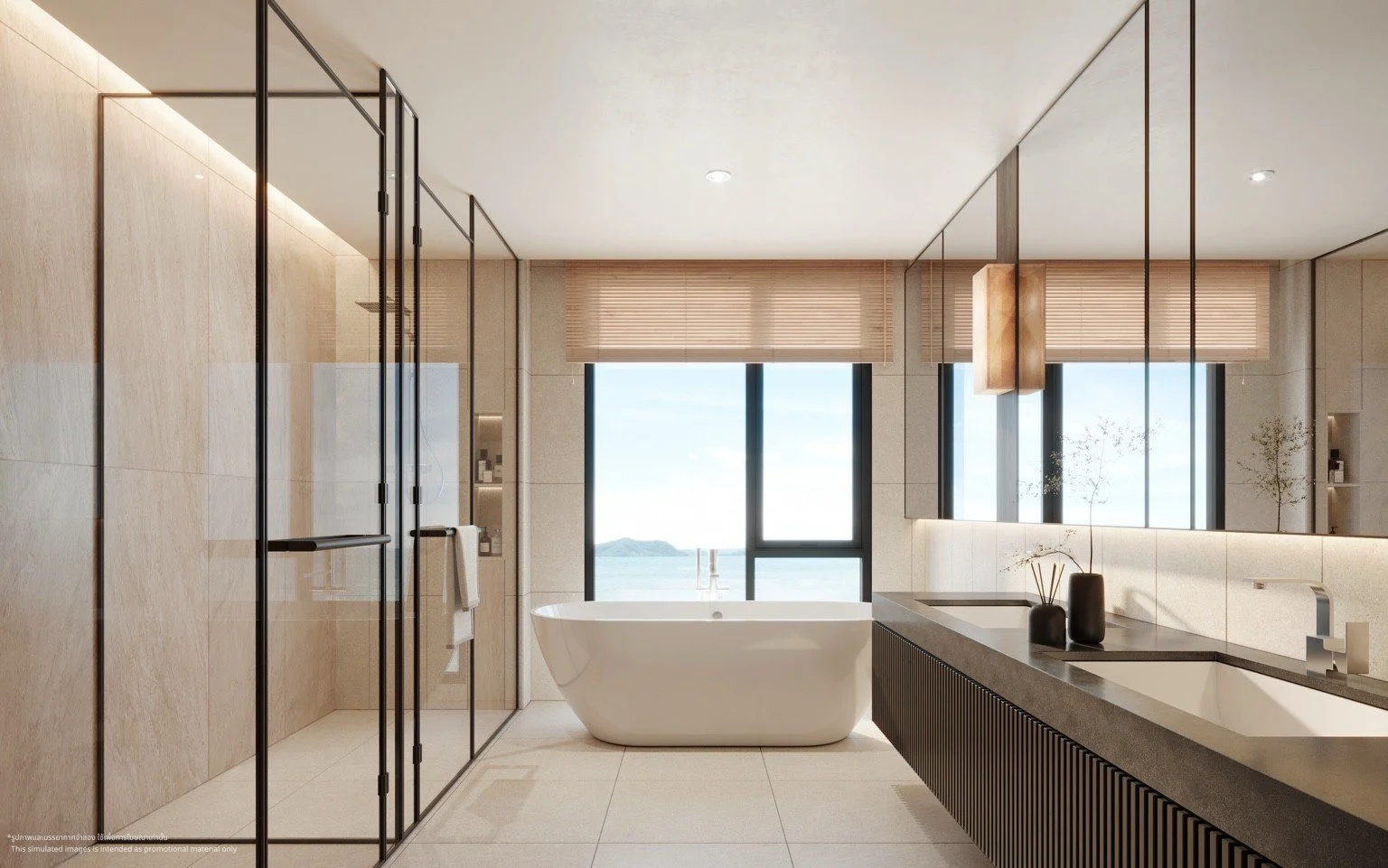 Master bathroom with freestanding bath and sea view at The Panora Estuaria.