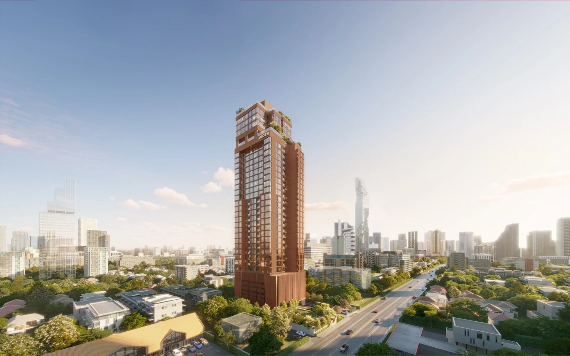 Widen by Sansiri condominium tower exterior in Sathorn, Bangkok, with city skyline and surrounding low-rise neighbourhood views.