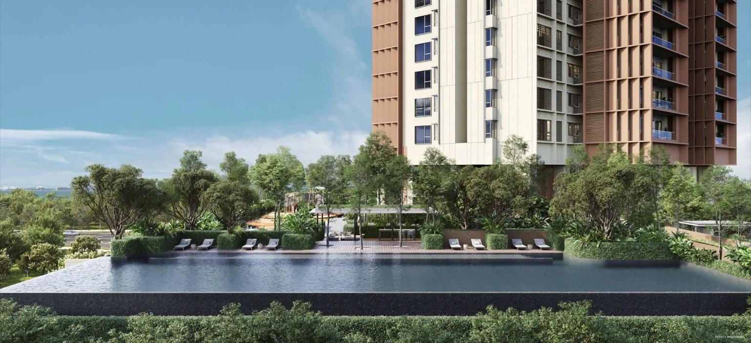 Infinity pool at The Lume by E&O with landscaped deck, poolside loungers and residential tower backdrop.