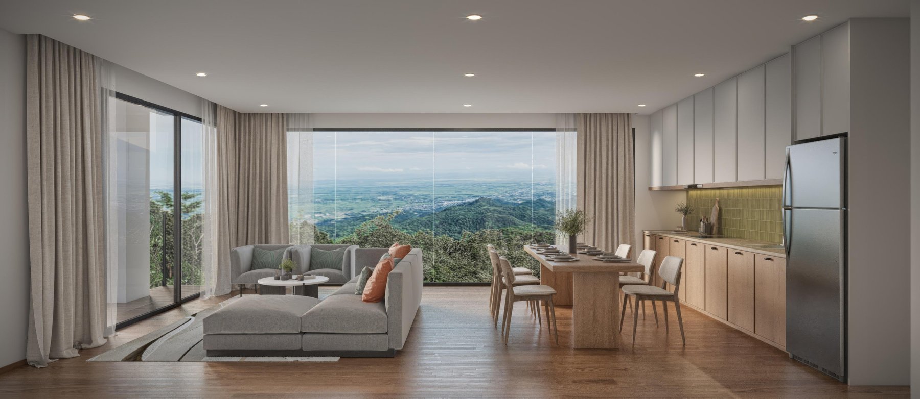 Open-plan living room in VIP Tropika condominium suite Phuket.