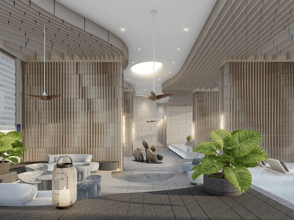 Lobby interior at Vehha Hua Hin featuring curved architectural design and relaxation spaces in Hua Hin, Thailand.