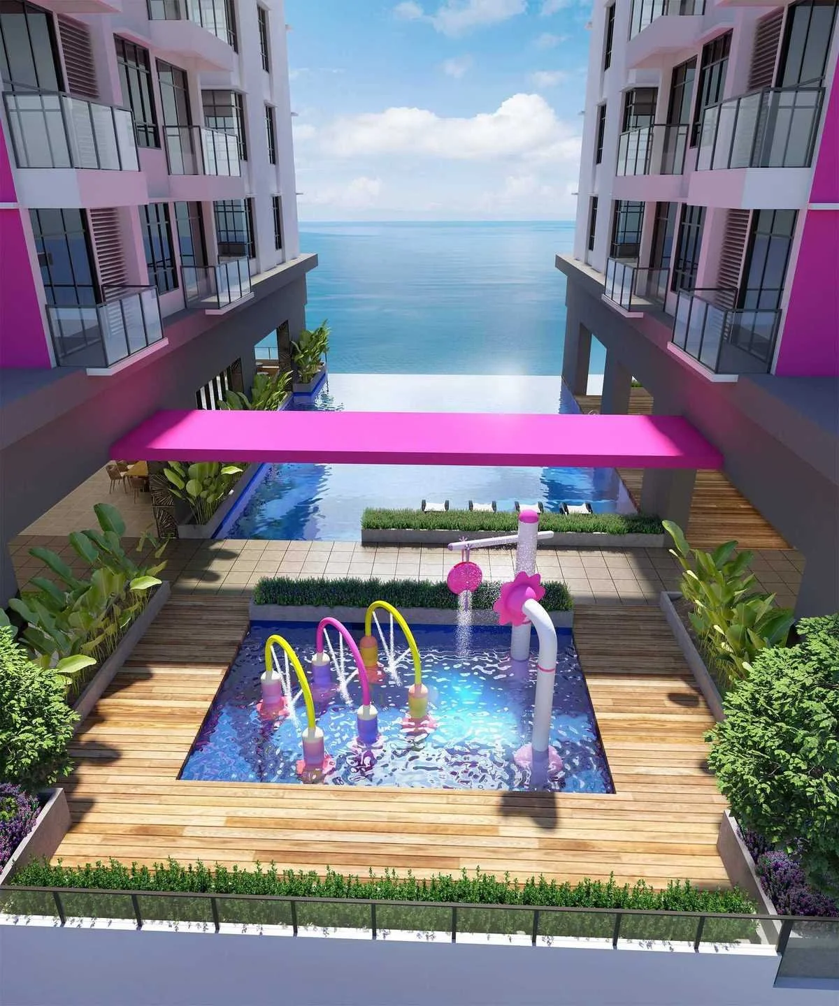 Infinity swimming pool at Blossom Suites overlooking the sea, with the coastline visible beyond the pool edge.