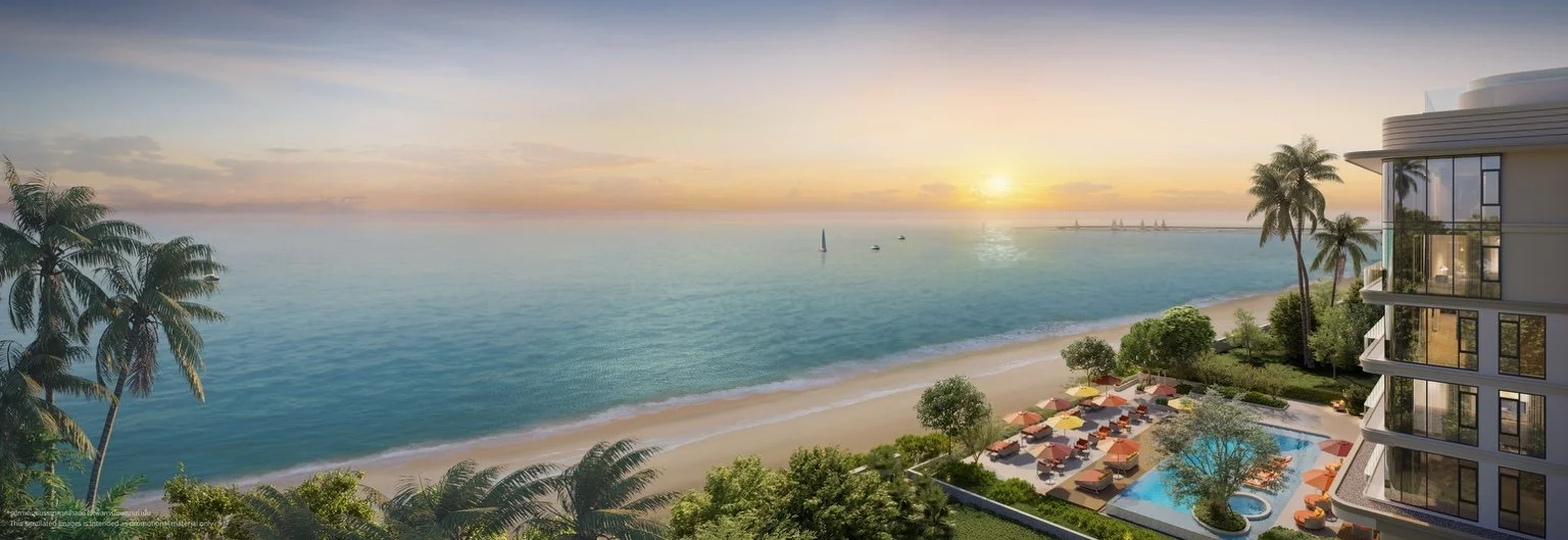 Sunset view of Panora Estuaria beachfront residence in Pattaya with infinity pool, palm trees and direct ocean frontage.