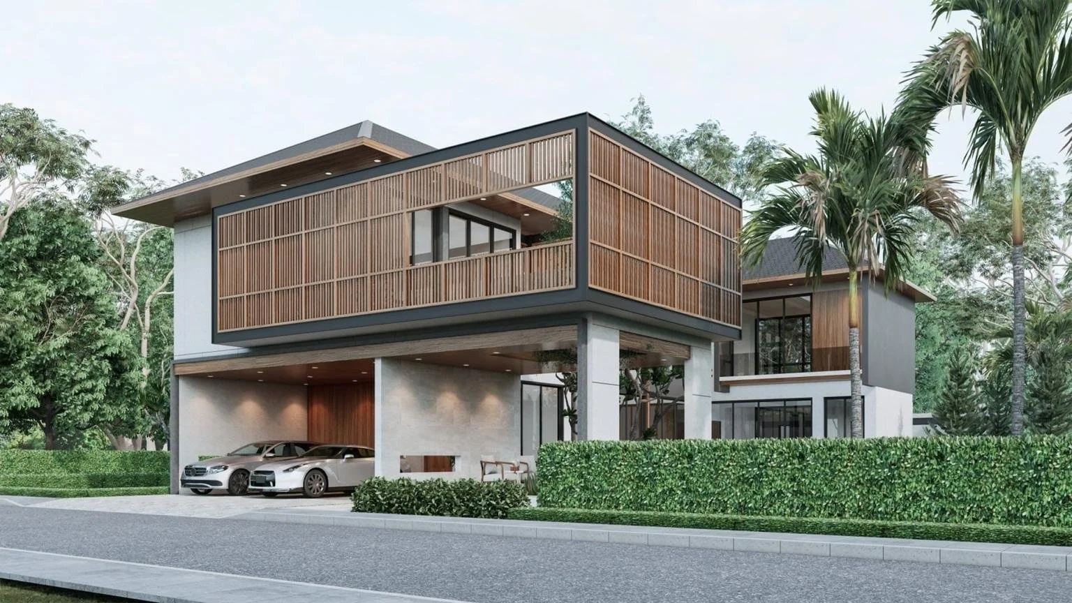 Entrance driveway and covered parking area of Mouana Grande luxury villa in Chalong Bay, Phuket.