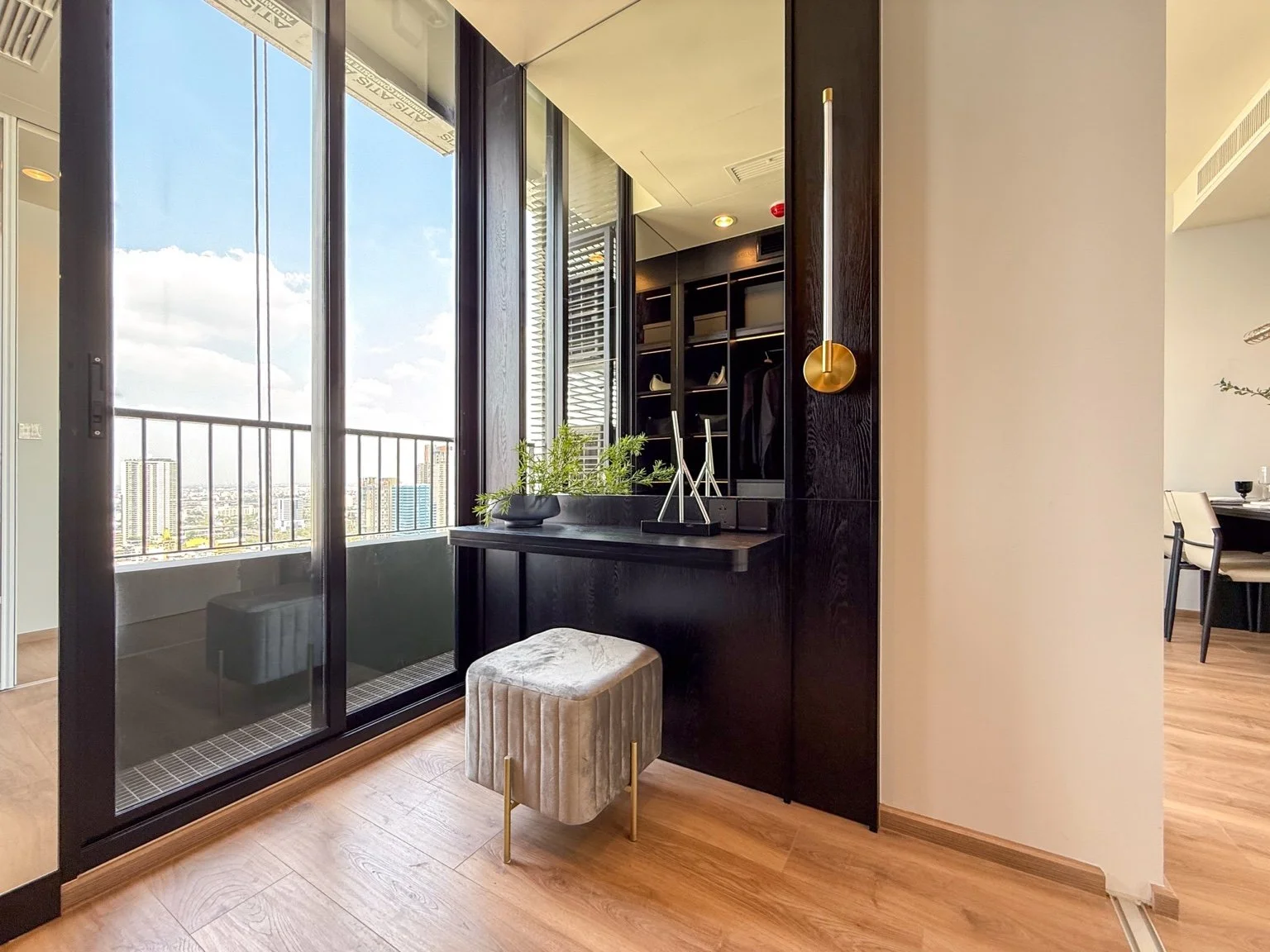 Vanity dressing table area at Noble Form Thonglor with mirror and seating.