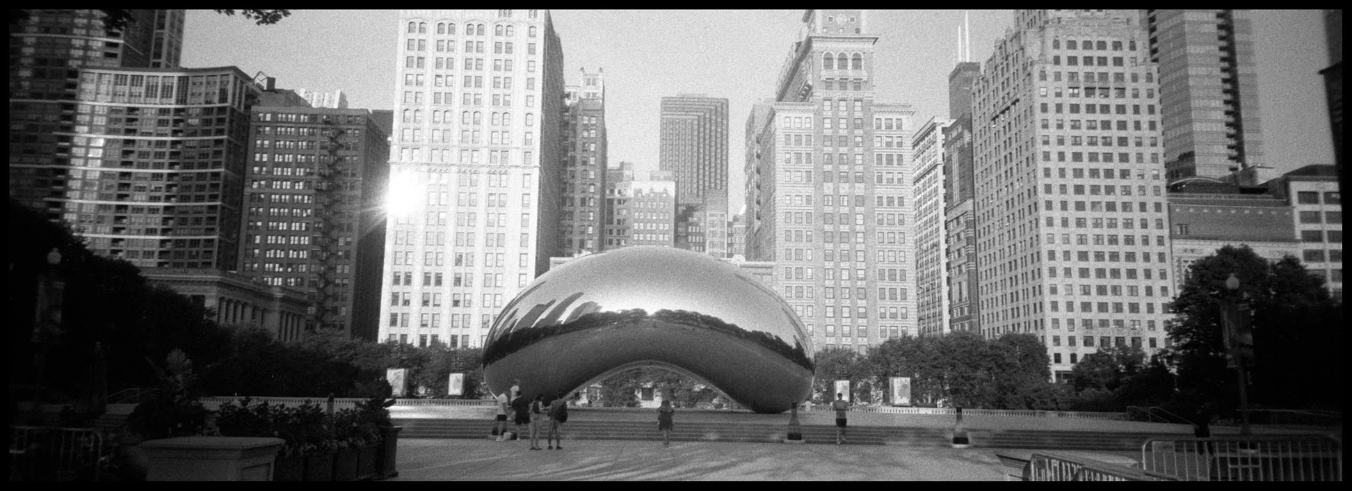 Chicago's Cloud Gate sculpture photographed with a Minolta P's panoramic 35mm compact point and shoot camera.