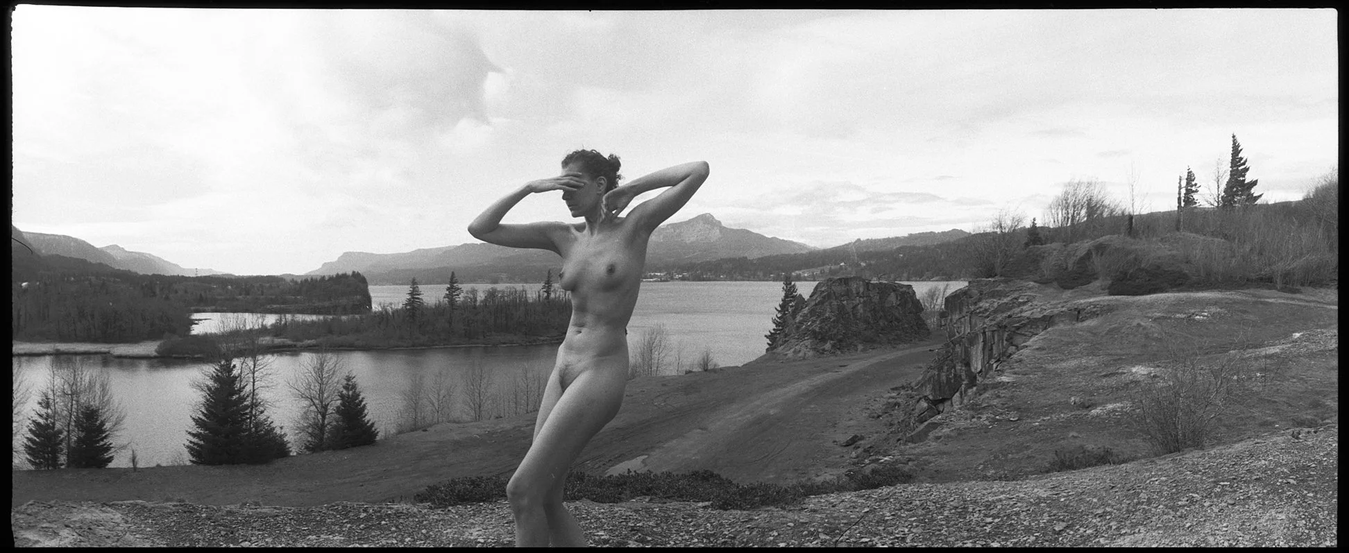 Fine art nude photograph made with a Panon Widelux F8 and Fomapan 100 35mm film in the Columbia River Gorge just outside Portland Oregon