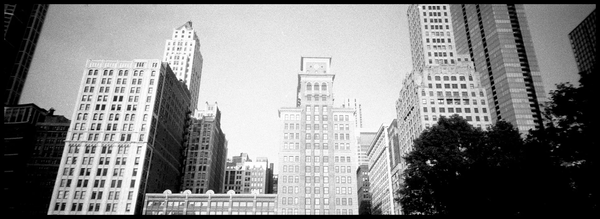 Downtown Chicago photographed with the Minolta P's 35mm compact point and shoot camera and Fomapan 100 35mm black and white film.