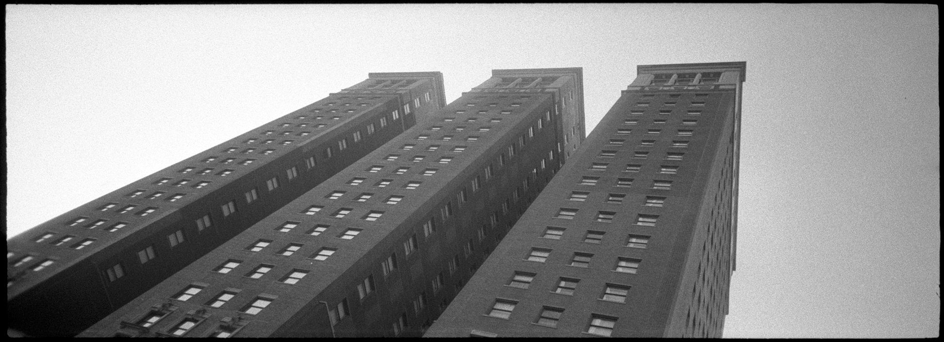Chicago skyline photographed with a Minolta P's panoramic 35mm camera and Fomapan 100 35mm black and white film.