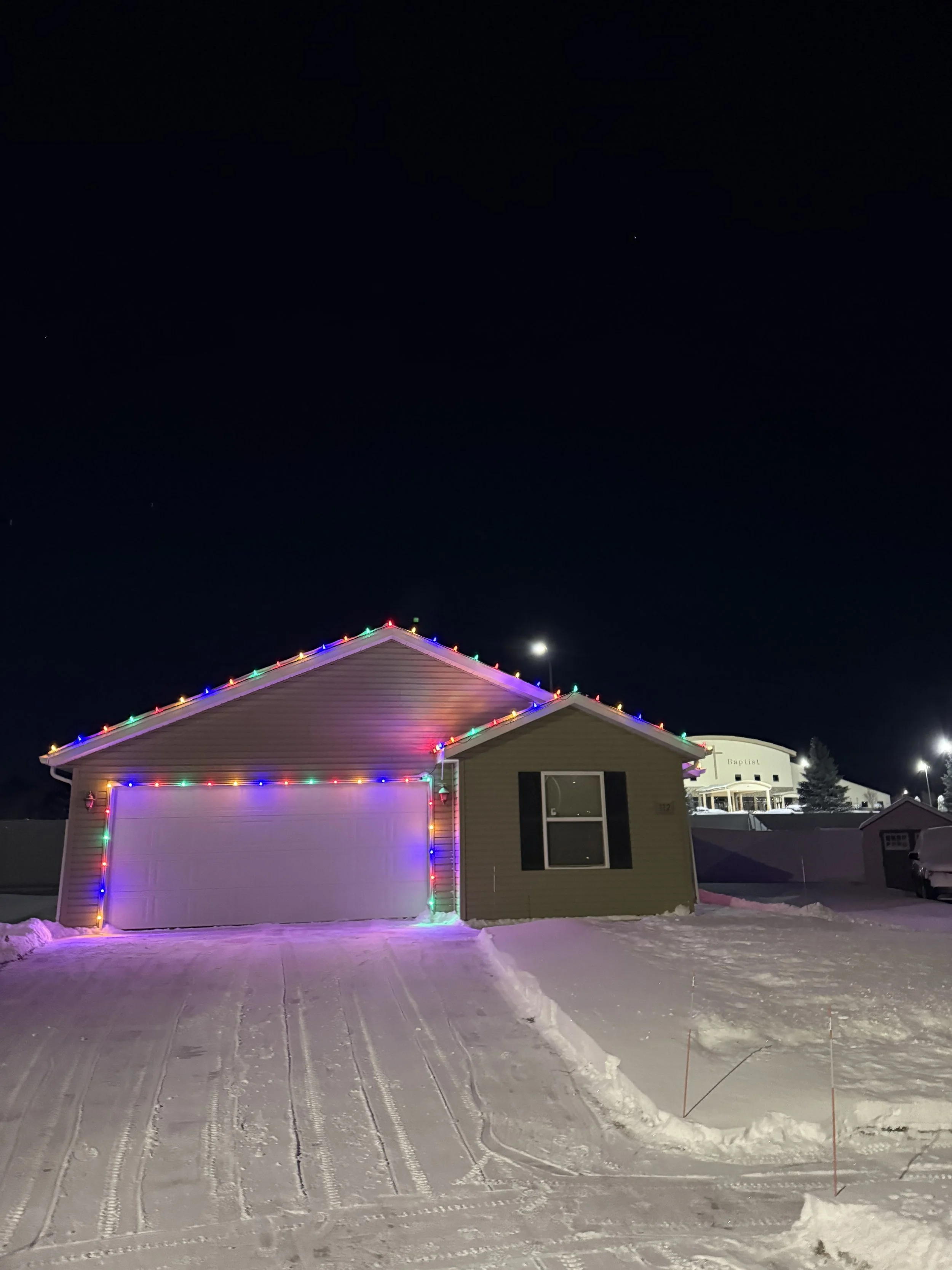 Commercial Christmas light installation in Mandan ND