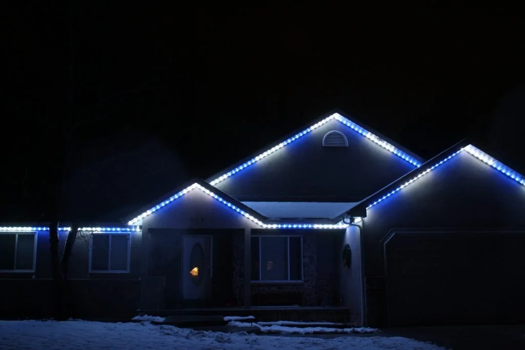 Mandan residential home illuminated with professional permanent lighting