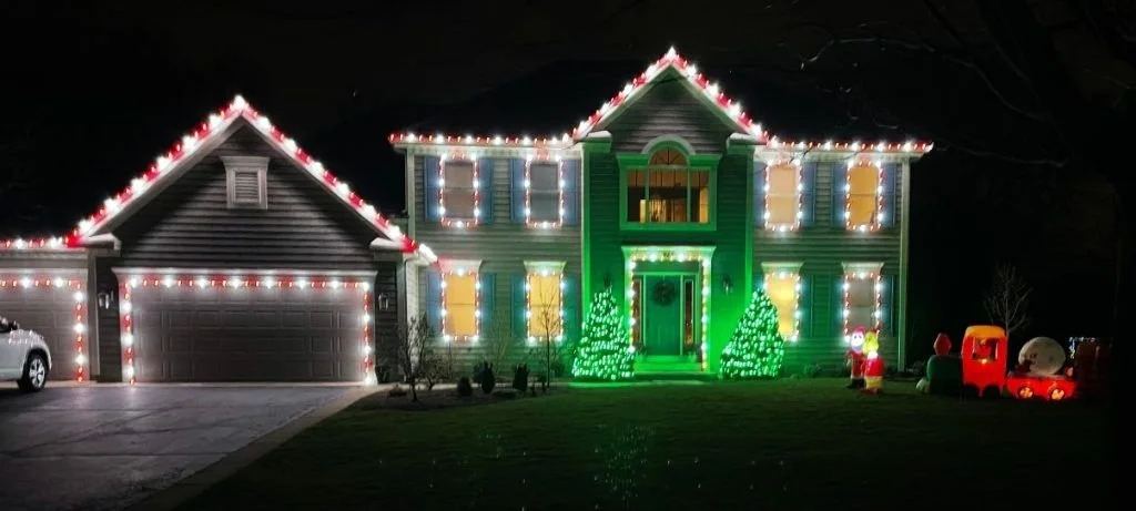 House in Mandan decorated with LED Christmas lights – festive residential holiday lighting installation