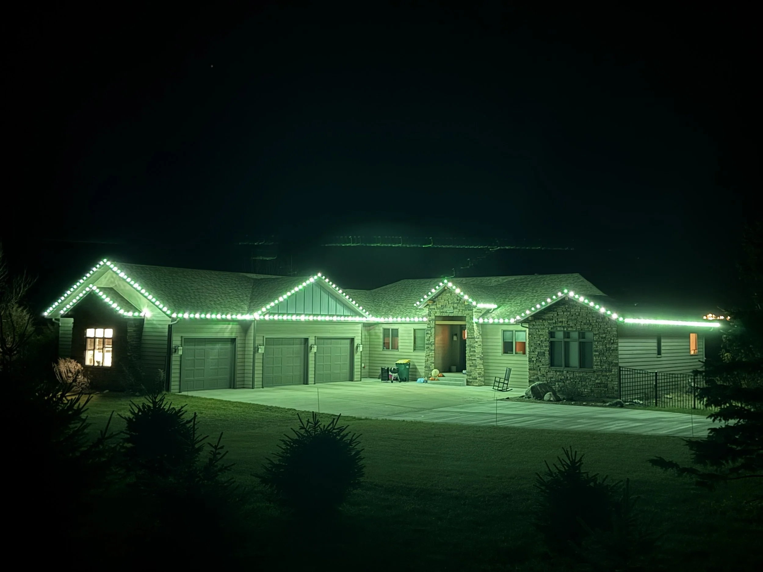 Professional Christmas light installation on a Heritage Ridge home in North Bismarck ND