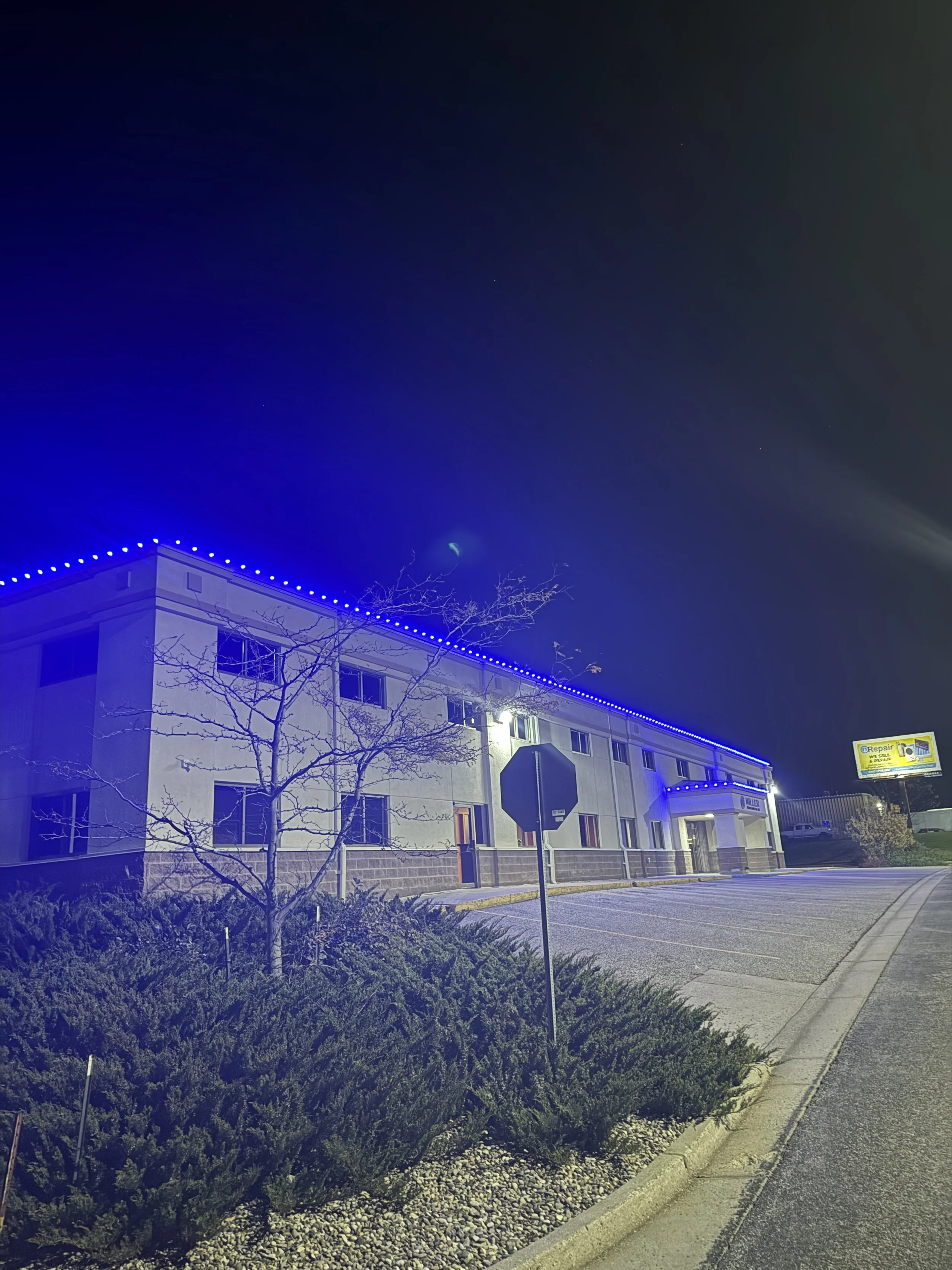 Miller Installation in Bismarck with blue LED Christmas lights – professional holiday lighting services