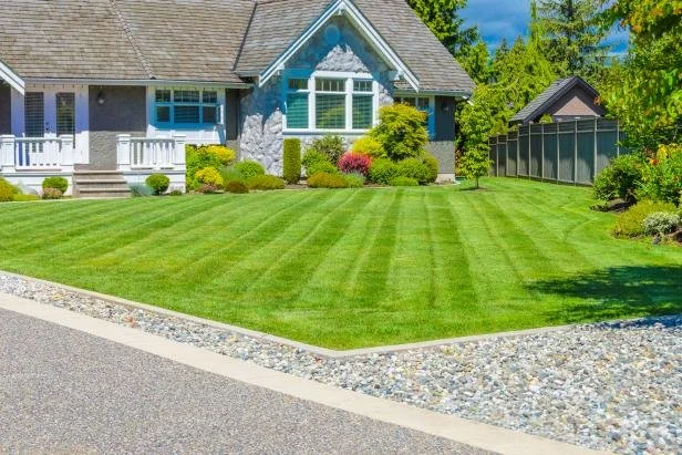 Lawn fertilization and care for residential properties in Mandan – professional lawn maintenance services