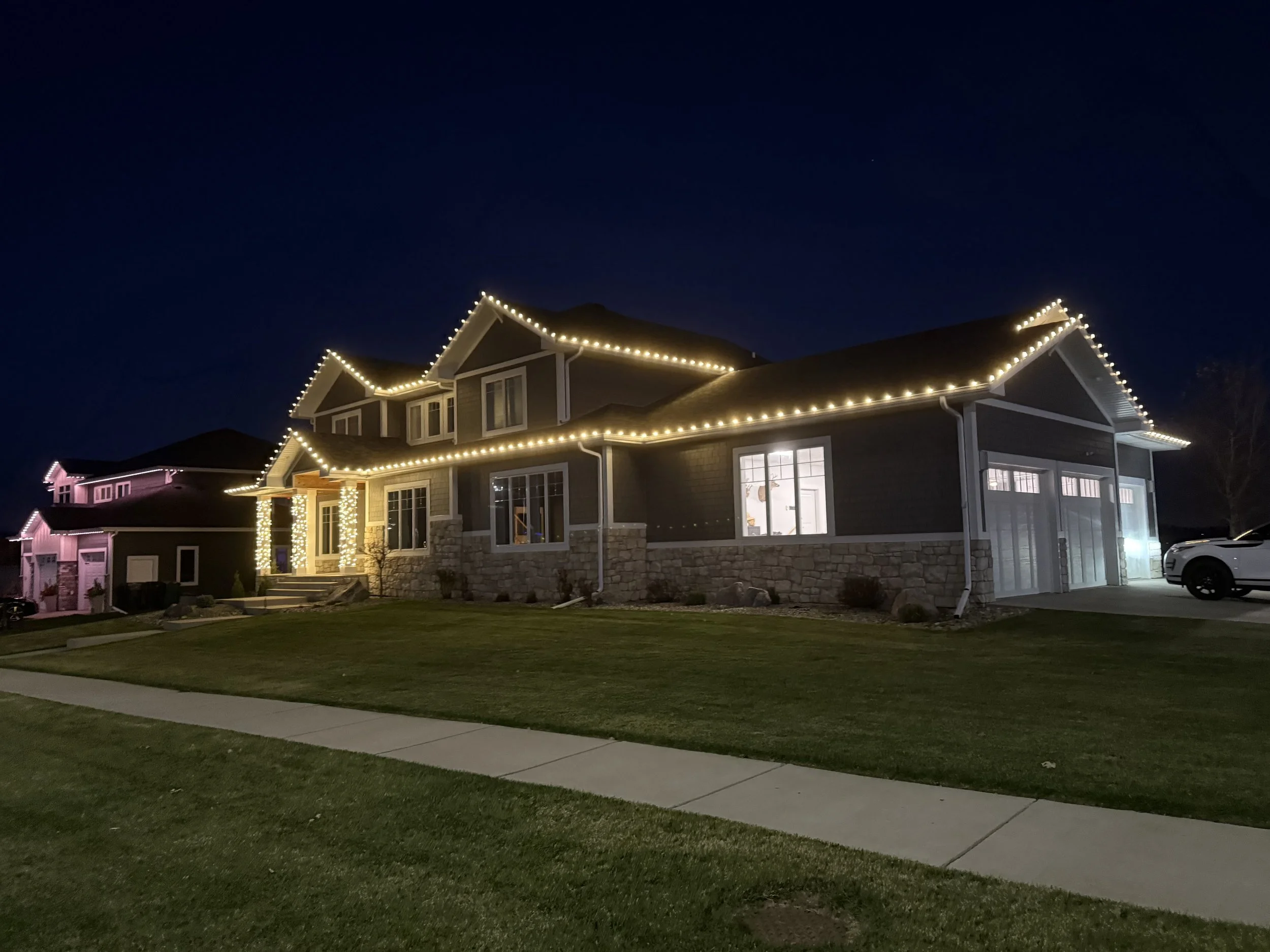 Tree and roof Christmas lights installed in Highland Acres Mandan ND