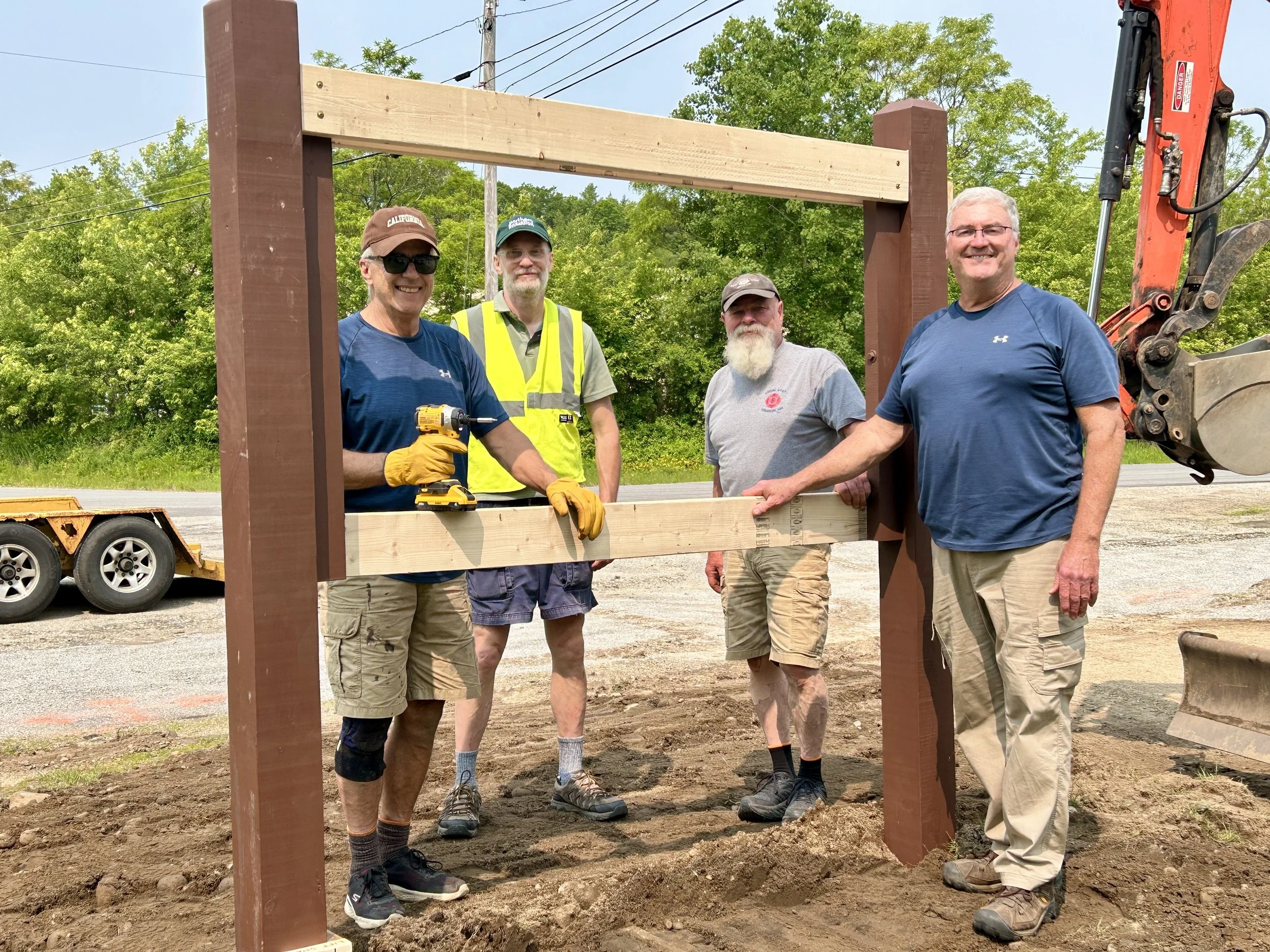 FNRT Maintenance crew erecting Commerce St. 'Welcome' sign.jpg