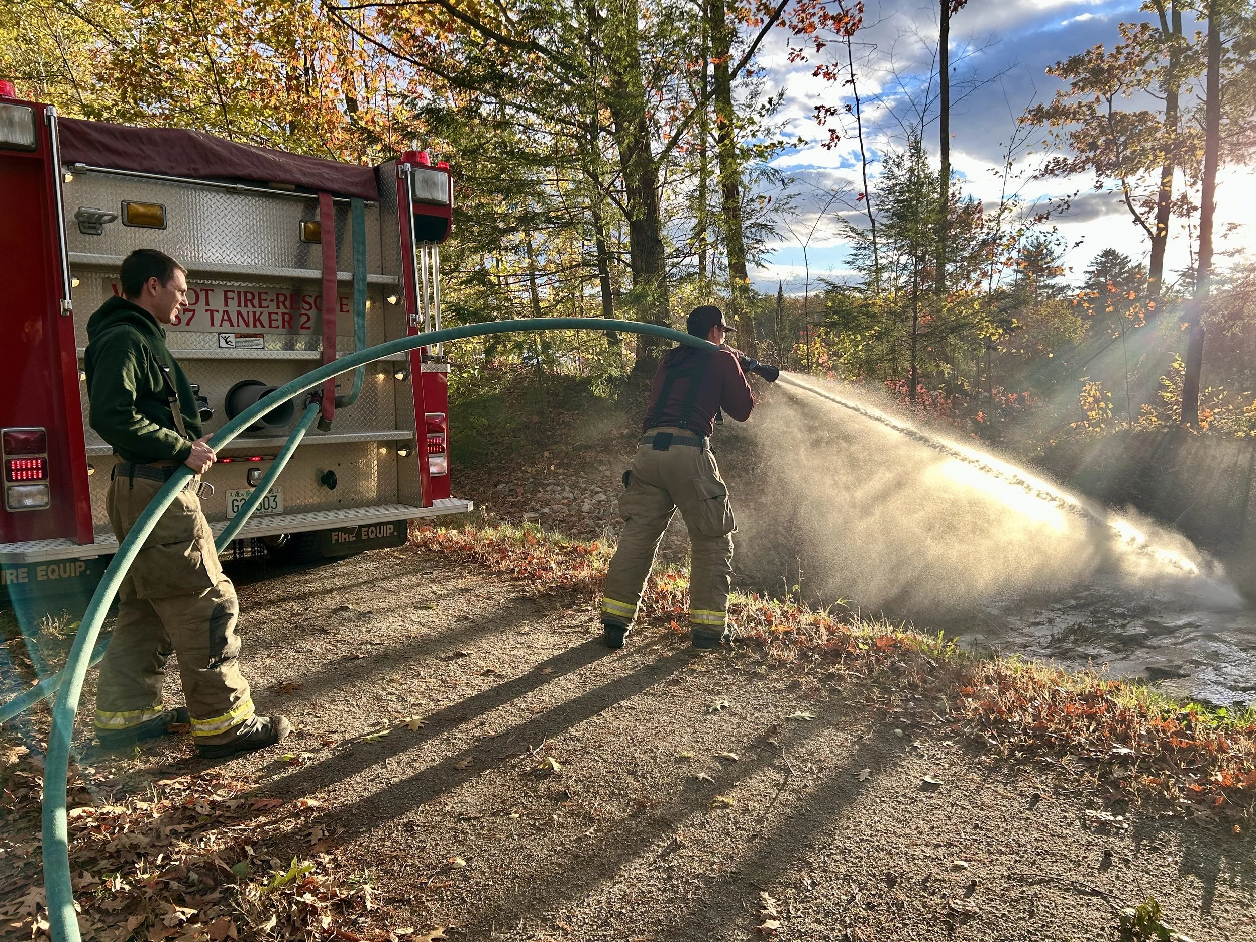 Wilmot Vol. Fire Dept clears Eagle Pond culvert.jpg