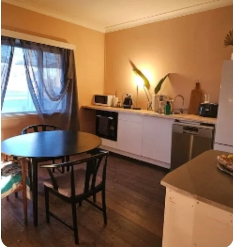 Warm kitchen and dining at golden hour, Mystic Muse Maker cottage