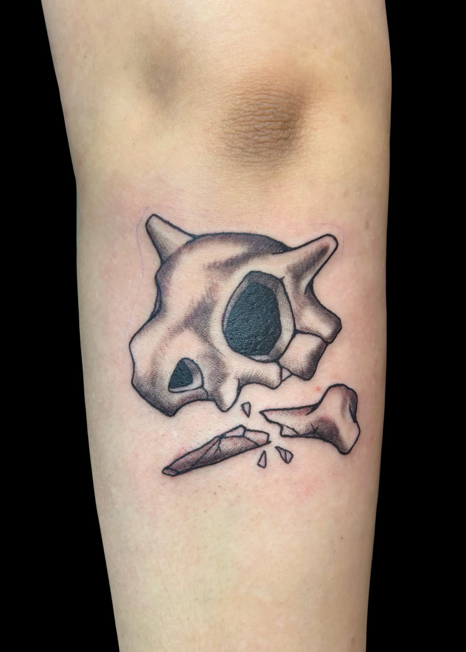 Zephyr oddzephyr_Cubone Skull Tattoo Milwaukee Wisconsin Black & Grey Tattoo Anime Pokemon.jpg