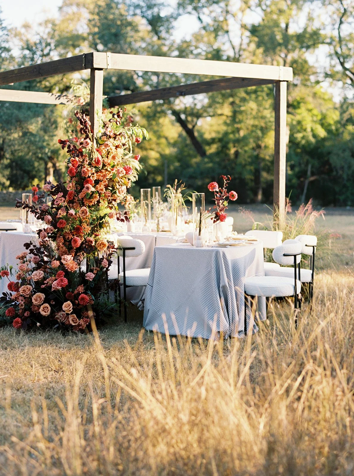 Elegant Garden Party Table Under Wood Pergola