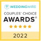 Gold badge with black text reading 'WeddingWire Couples' Choice Awards' and five gold stars, indicating a 2022 award.