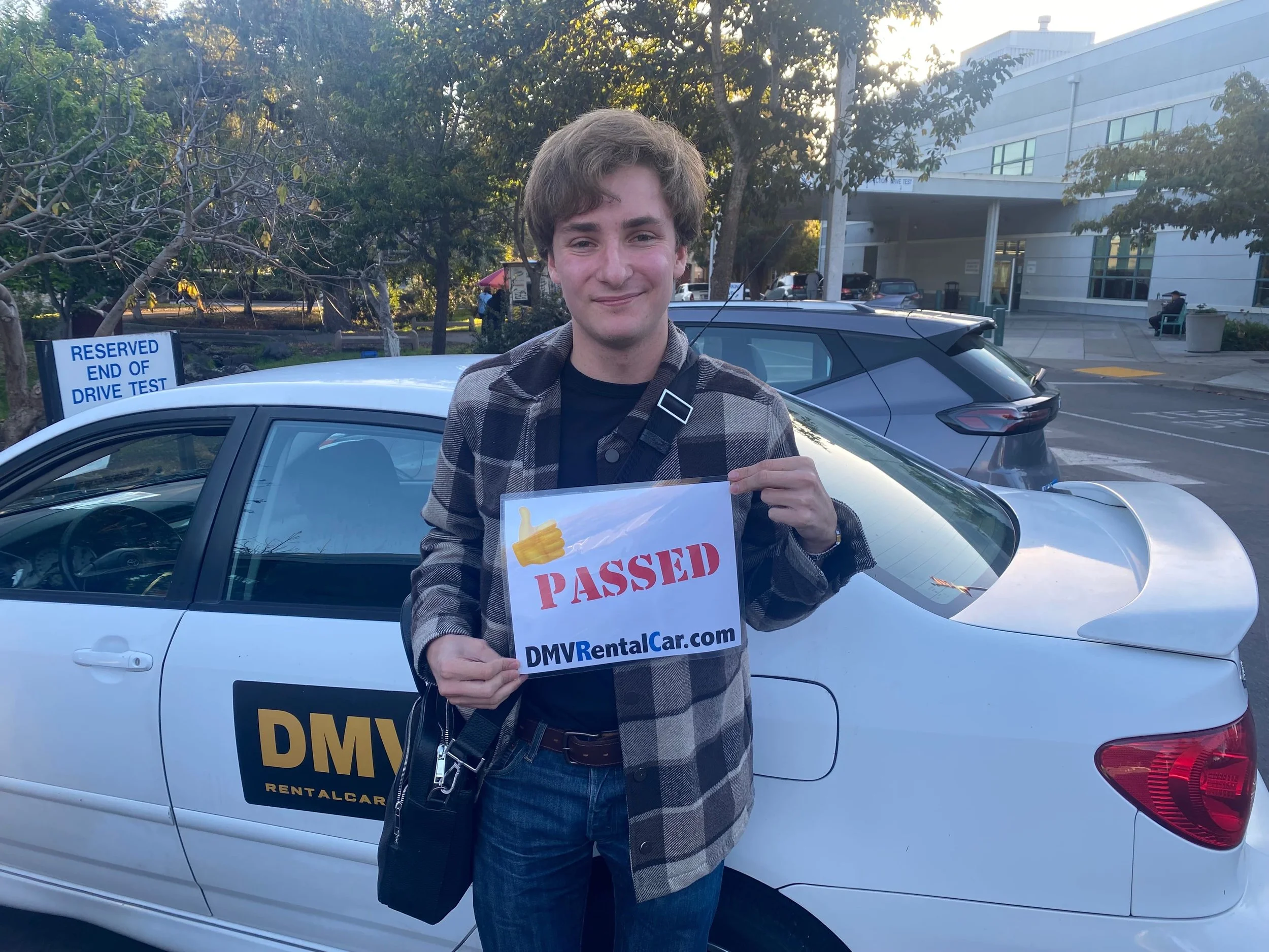 Successful behind-the-wheel exam at the Oakland DMV with our test-day car.