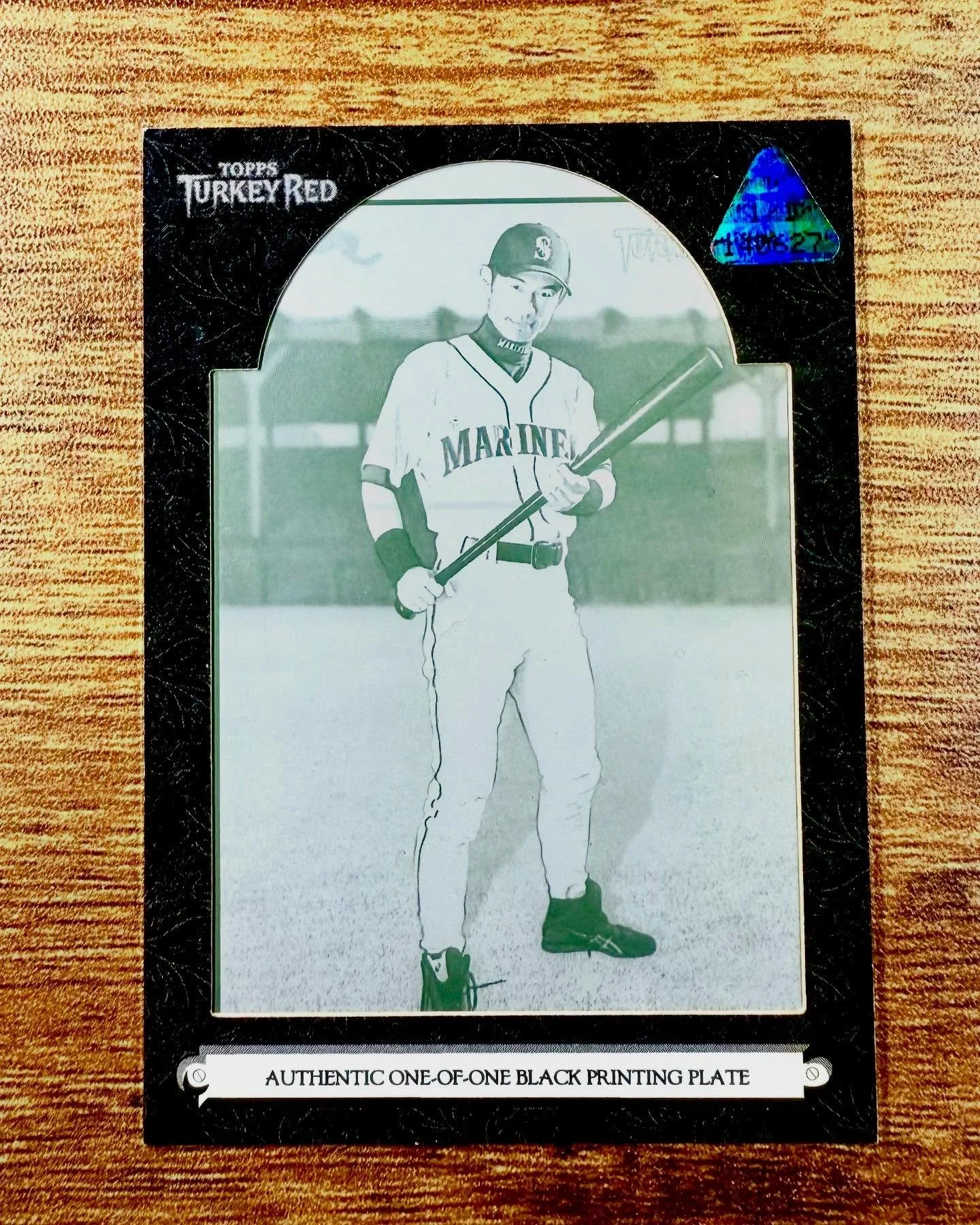 My first Ichiro 1 of 1!! 2006 Topps Turkey Red black printing plate. Man, I love the way they used to house printing plates in cardstock. This one is super awesome with the 1/1 sticker and the one of one designation at the bottom of the frame. This c