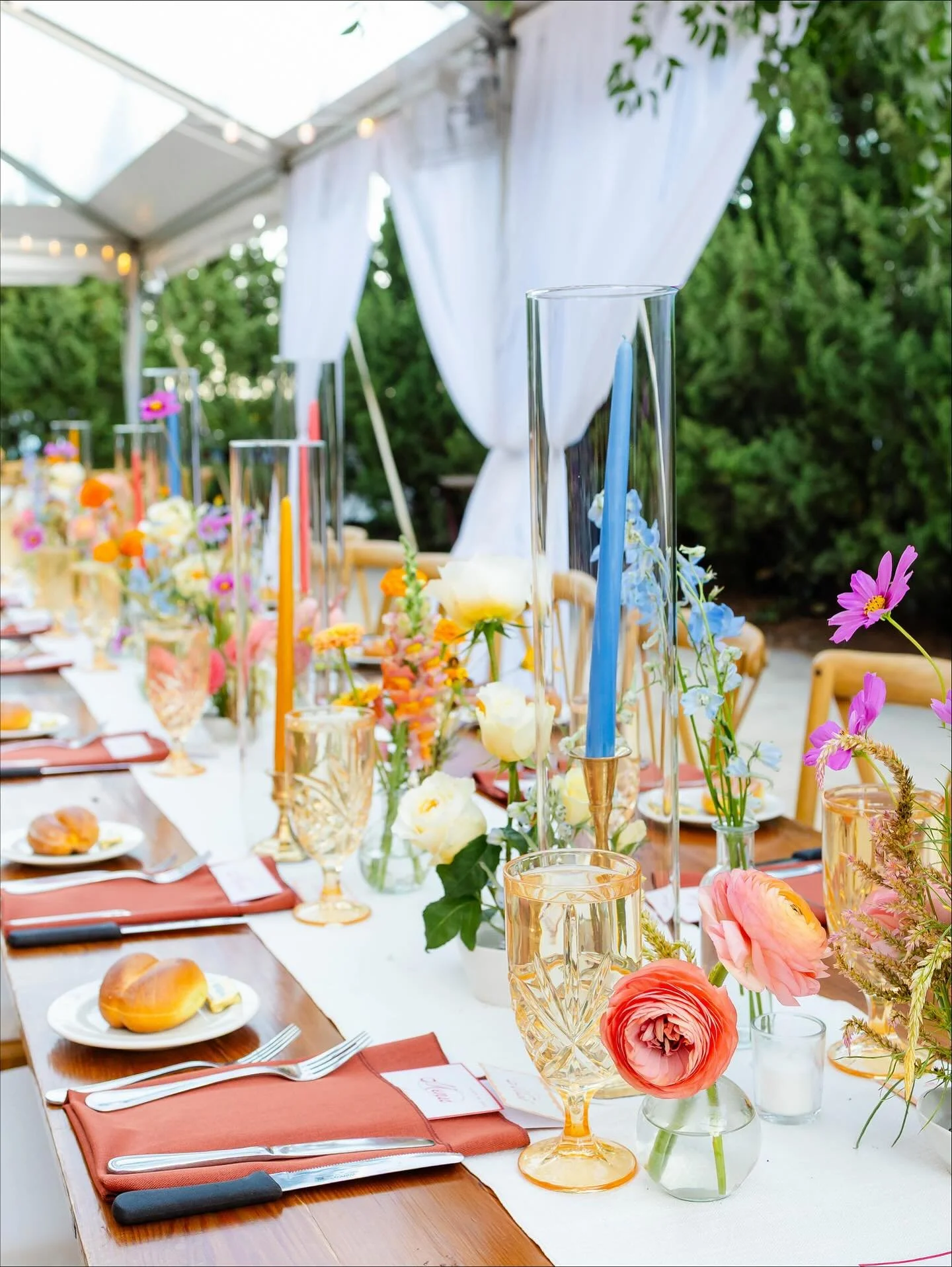 We loved this warm, colorful August wedding reception at The Asbury. Bride Aly paired our Venice Water Goblet in Sunset with our new Finery Linen Napkin series in Terracotta. The orange tableware accents created such a gorgeous, glowy atmosphere. We
