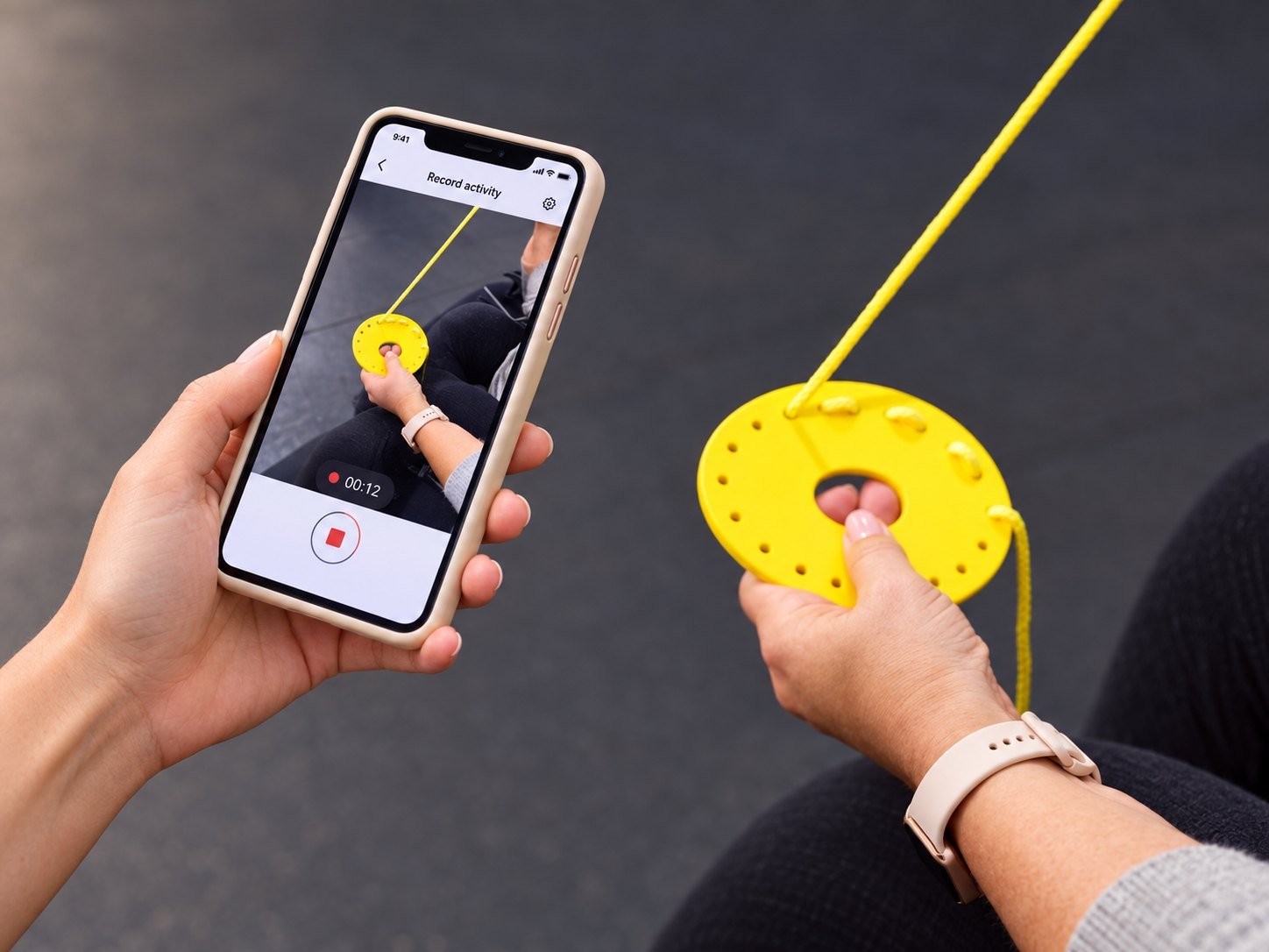 Client recording a hand exercise in the Plasticise app