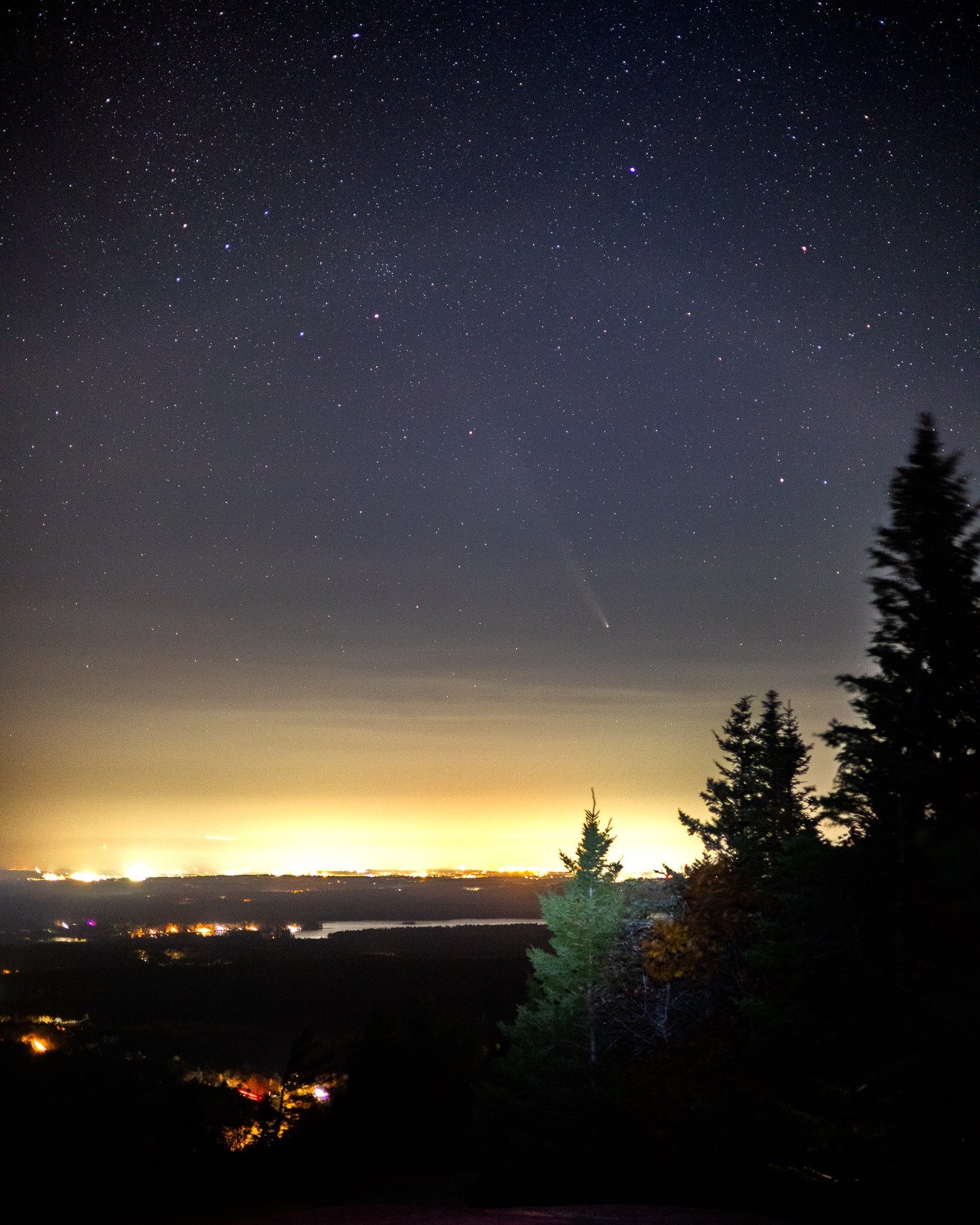 Comet over Bangor and Chemo Pond
Not the best night shot I've ever taken, but I like it. This is from last Oct as I tried to get the last glimpses of the comet from one of Chick Hill (one of my favorite in the area). That's Chemo pond in the foregr