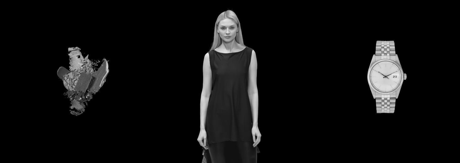 Monochrome composition of a woman in a black dress, a makeup arrangement and a wristwatch.