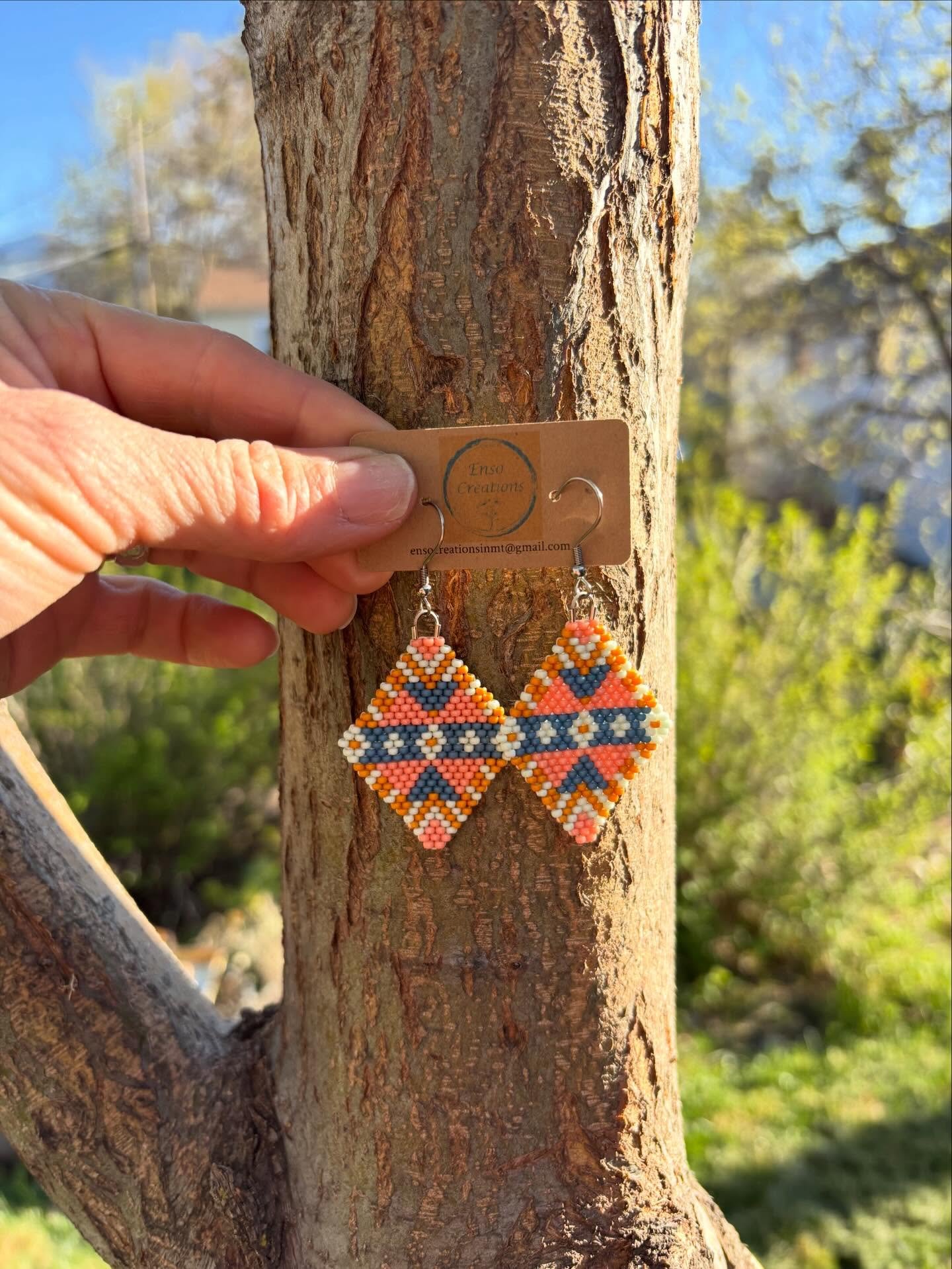 Tiny flowers, soft colors, and a little bit of sunshine in every swing 🌼

Peach, blue, mint, and yellow coming together in the sweetest way&mdash;light, playful, and easy to wear with just about anything.

Hand-beaded and one of a kind ✨ snag yourse