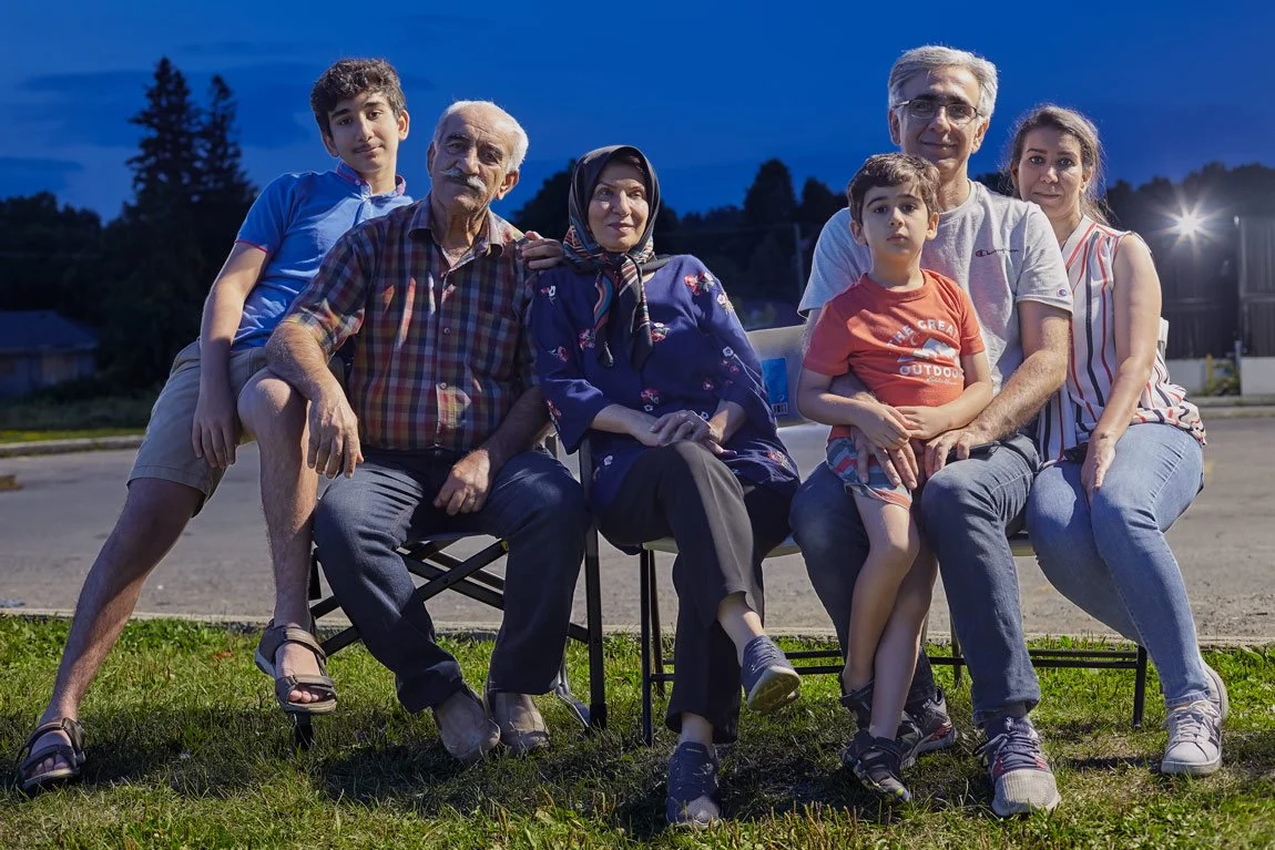 persian-iranian-canadian-family-multigeneration-parking-lot-fastfood-restaurant-night.jpg