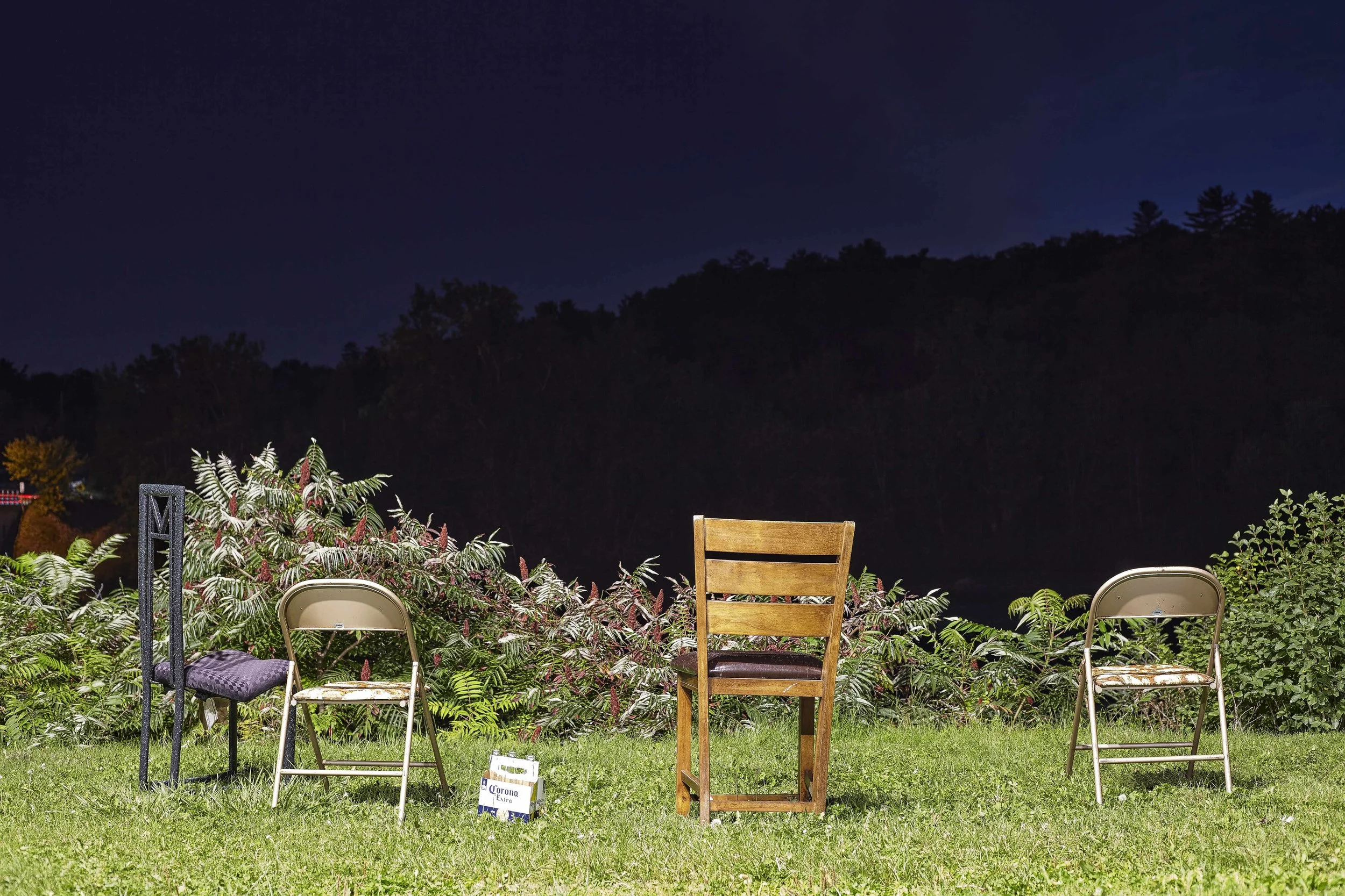 chairs-beer-empties-grass-river-night-documentary-photography.jpg