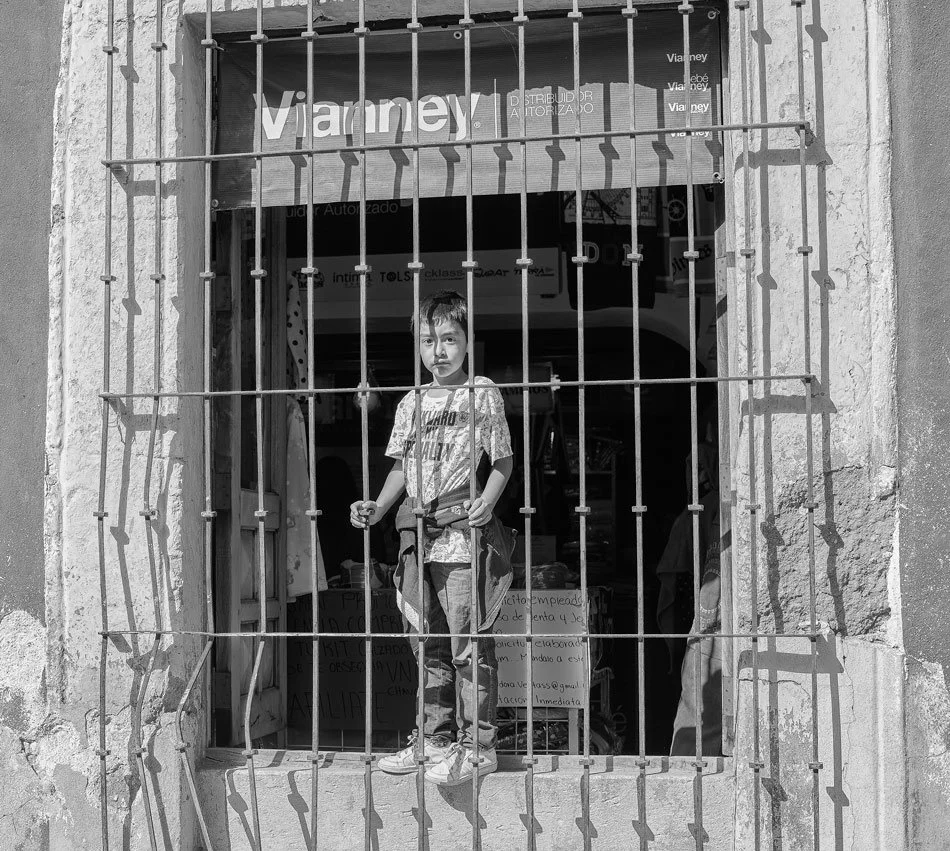 Boy in Shop Window