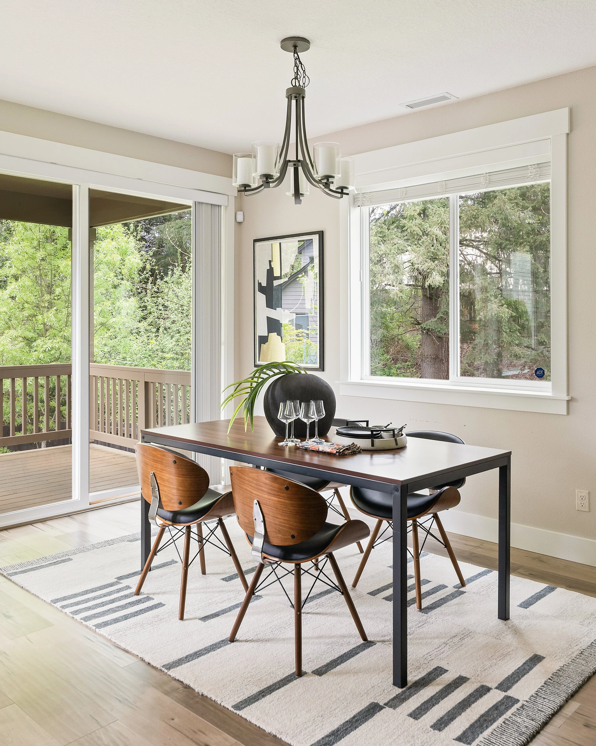 Modern dining room photographed for a Portland, Oregon real estate firm.  Natural light, warm tones.