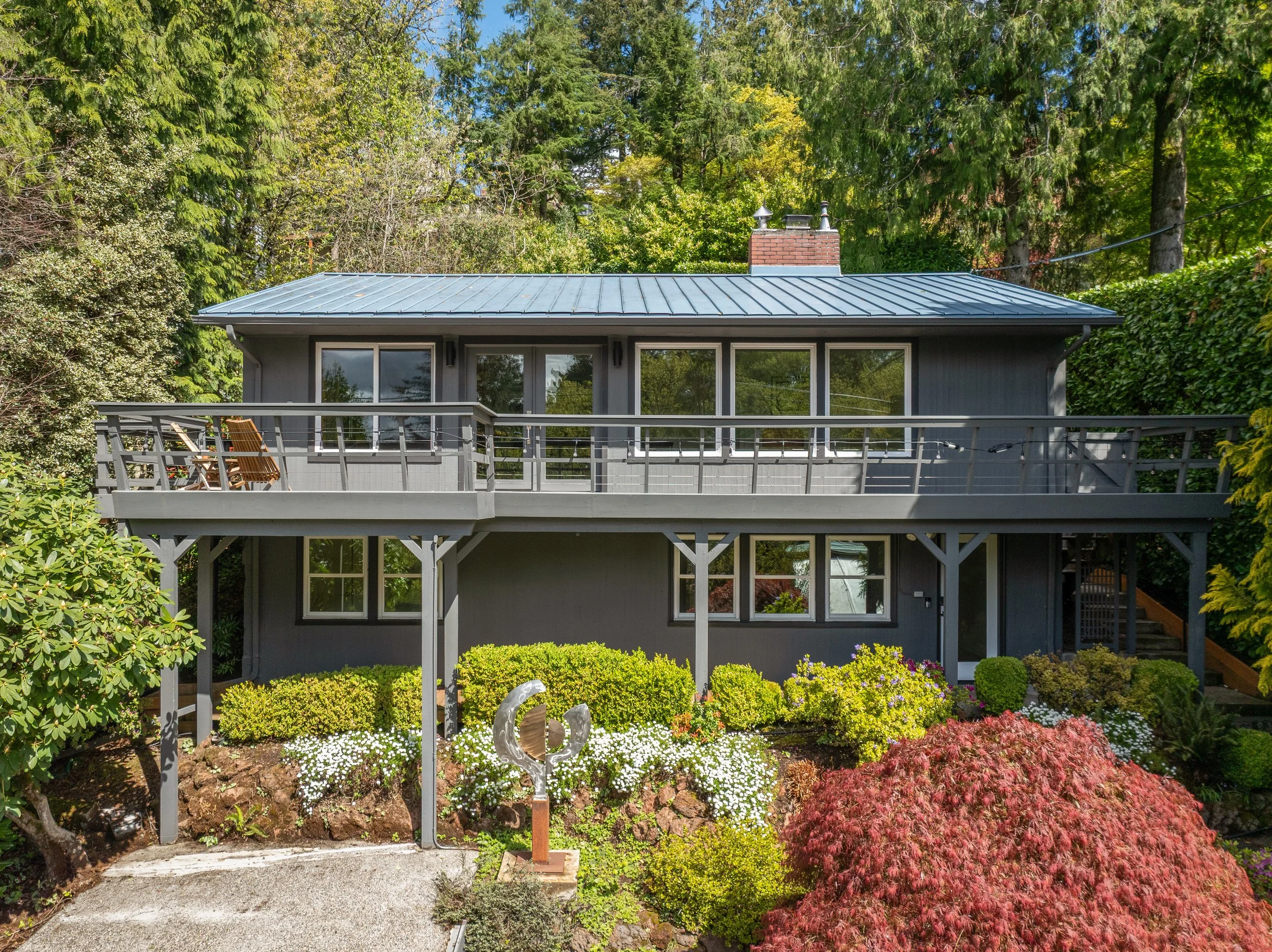 Southwest hills of Portland, Oregon.  Mid-Century home photographed with a drone for a design forward real estate firm.