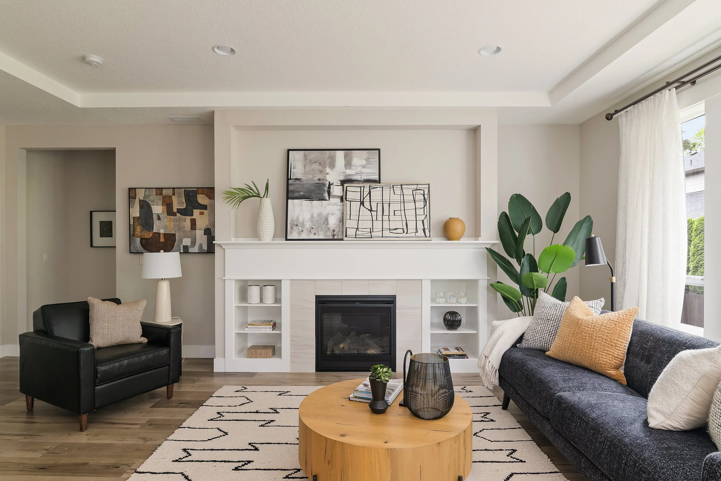Modern living room photographed for a Portland, Oregon real estate firm.  Natural light, warm tones.