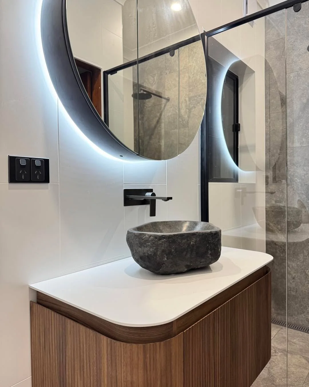 Light up your bathroom with tailored solutions: shower niche lighting, illuminated mirrors, and under-vanity floor glow &mdash; professionally installed to perfection. #dubbo #dubboelectrician #electricianaustralia #dubbocity #QualityWorkmanship