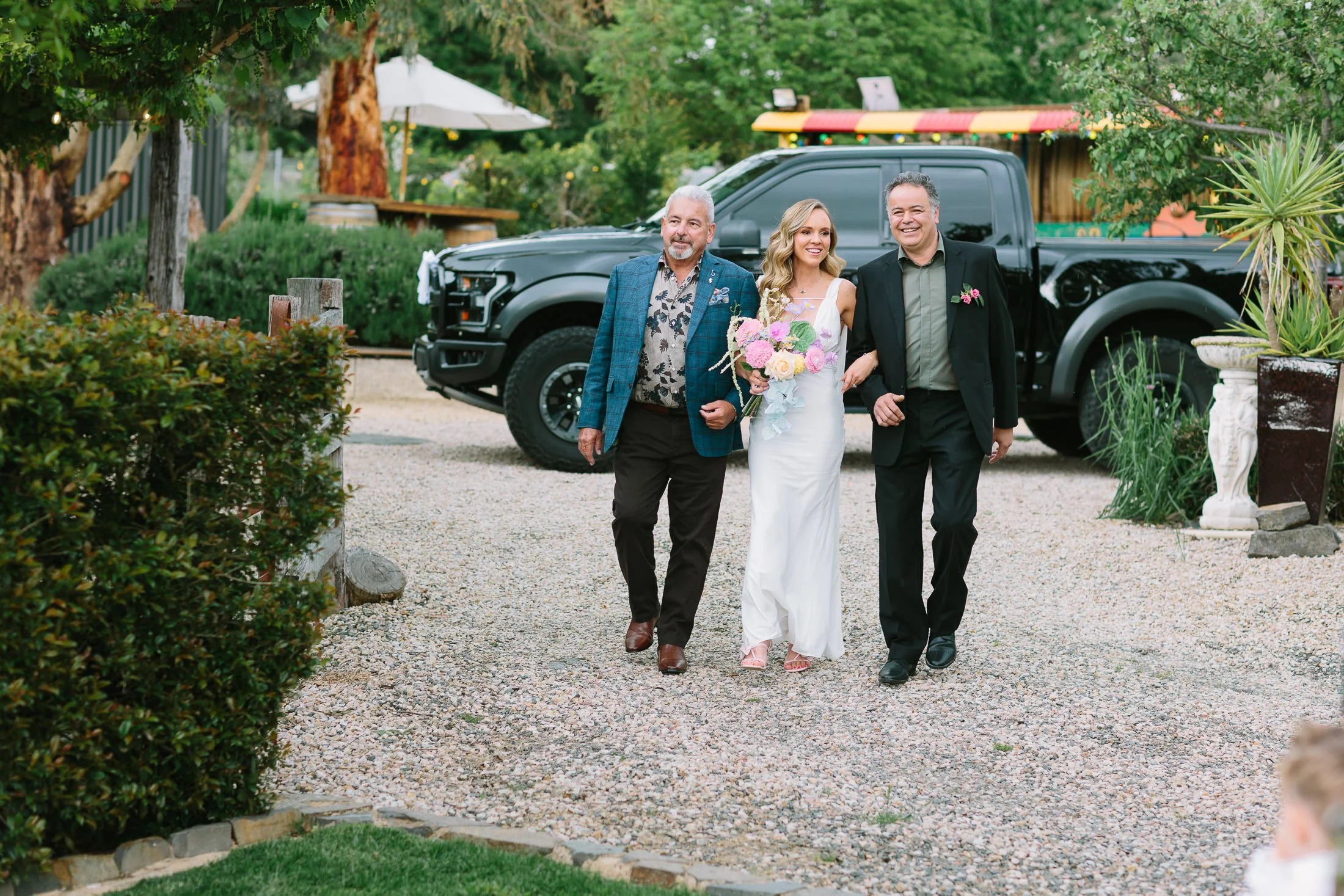 Bride with he dads walking down the isle 