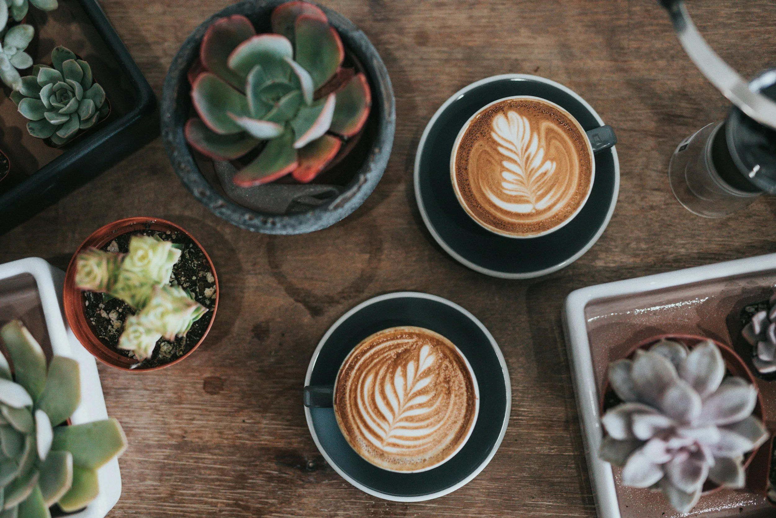 Two coffees on table promoting healthy habits