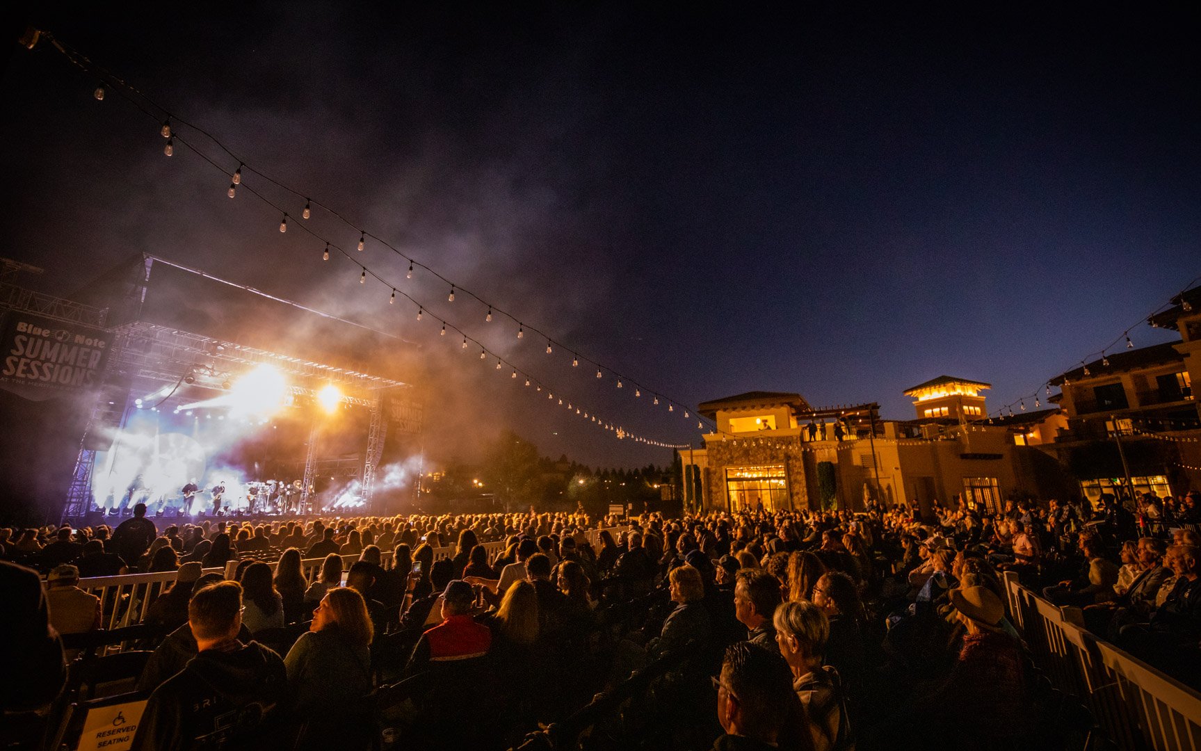 untitled-170-crowd-seated-dramaticlighting-stage.jpg