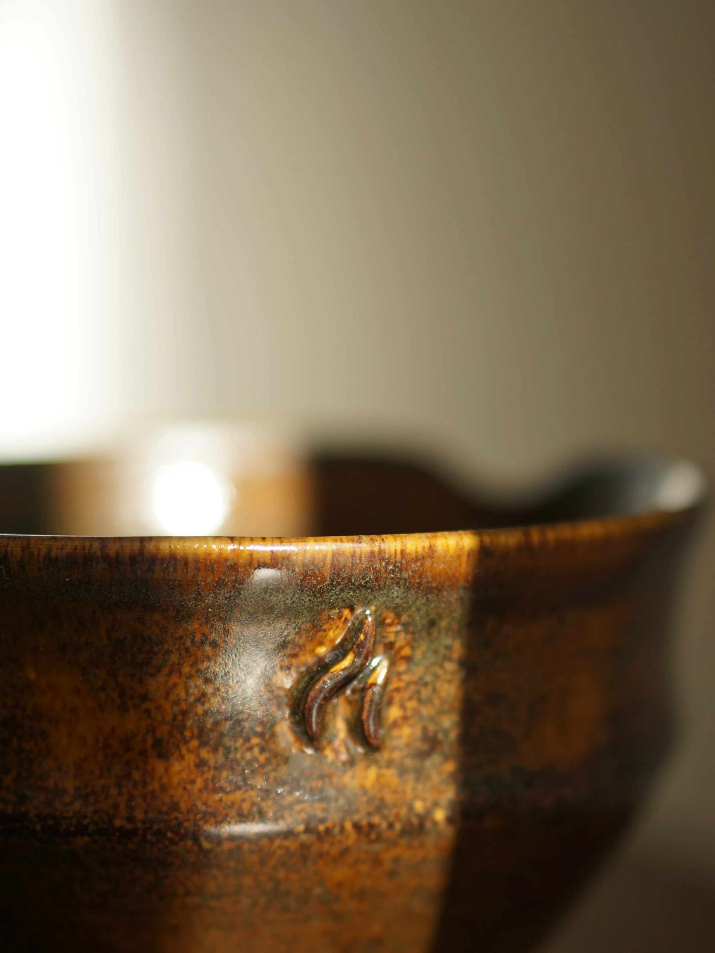 A closer look at the custom ramen bowls I recently made. The glaze details and the embossed logo are simply amazing.