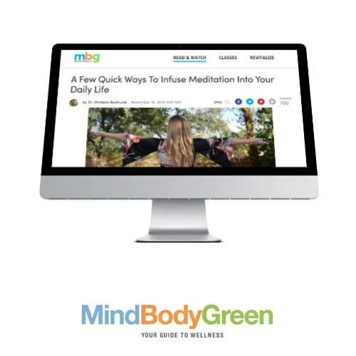 Dr. Michele Burklund  on a Computer monitor displaying a webpage titled "A Few Quick Ways To Infuse Meditation Into Your Daily Life" from MindBodyGreen.
